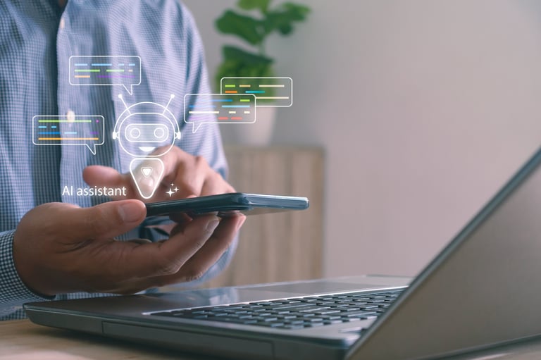Business owner using AI assistant on smartphone and laptop